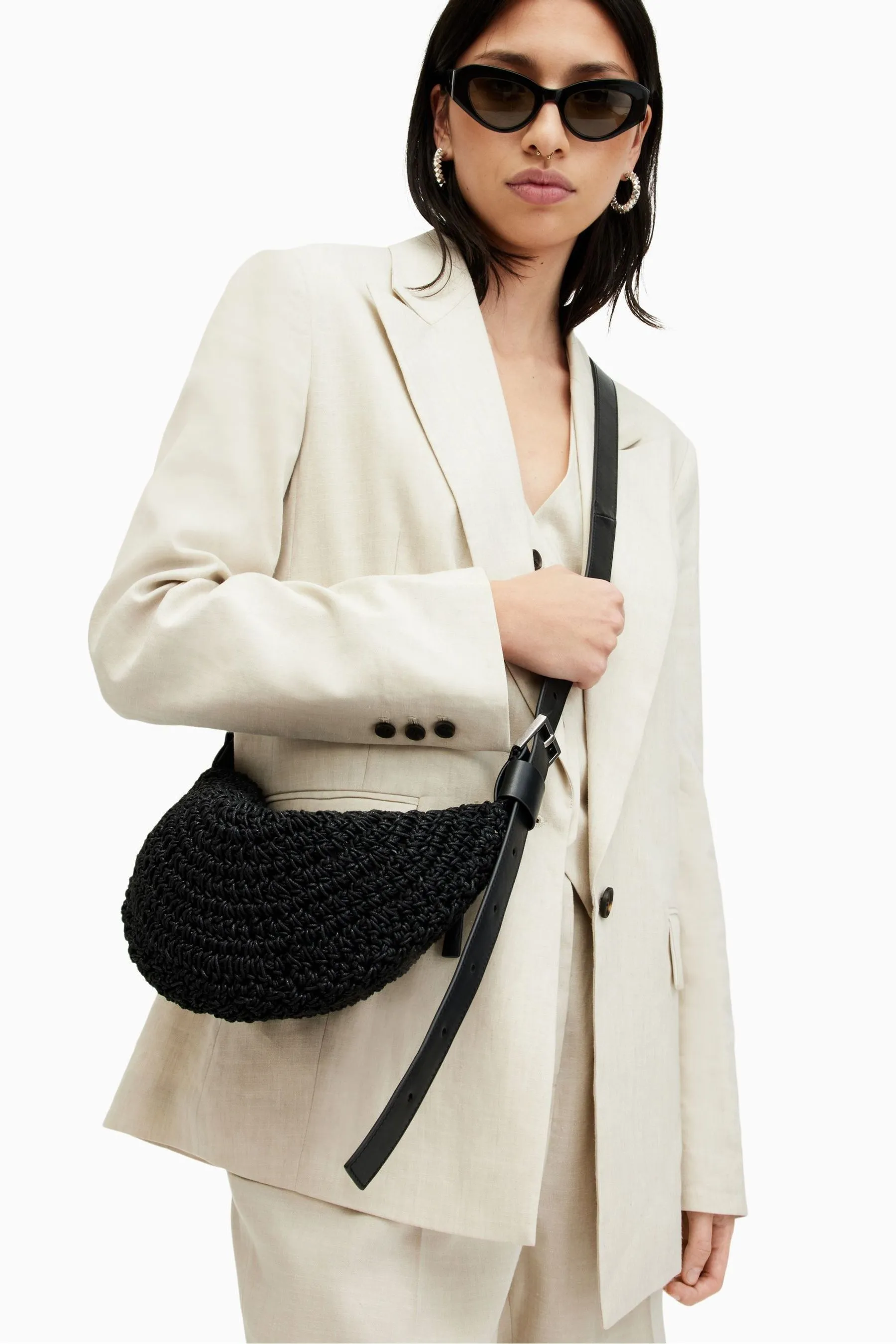 AllSaints - Borsa a tracolla a mezzaluna con nodo    