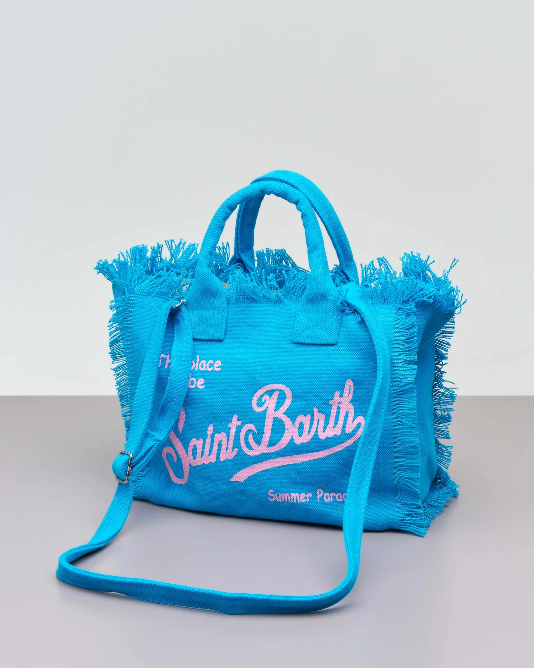 Borsa Colette turchese in cotone con logo rosa e orli sfrangiati