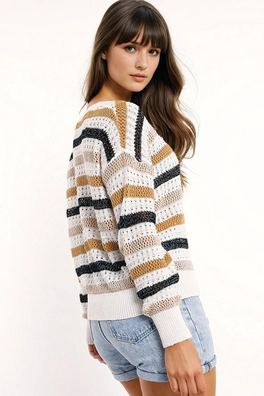 Maglione in maglia bianca a righe multicolori