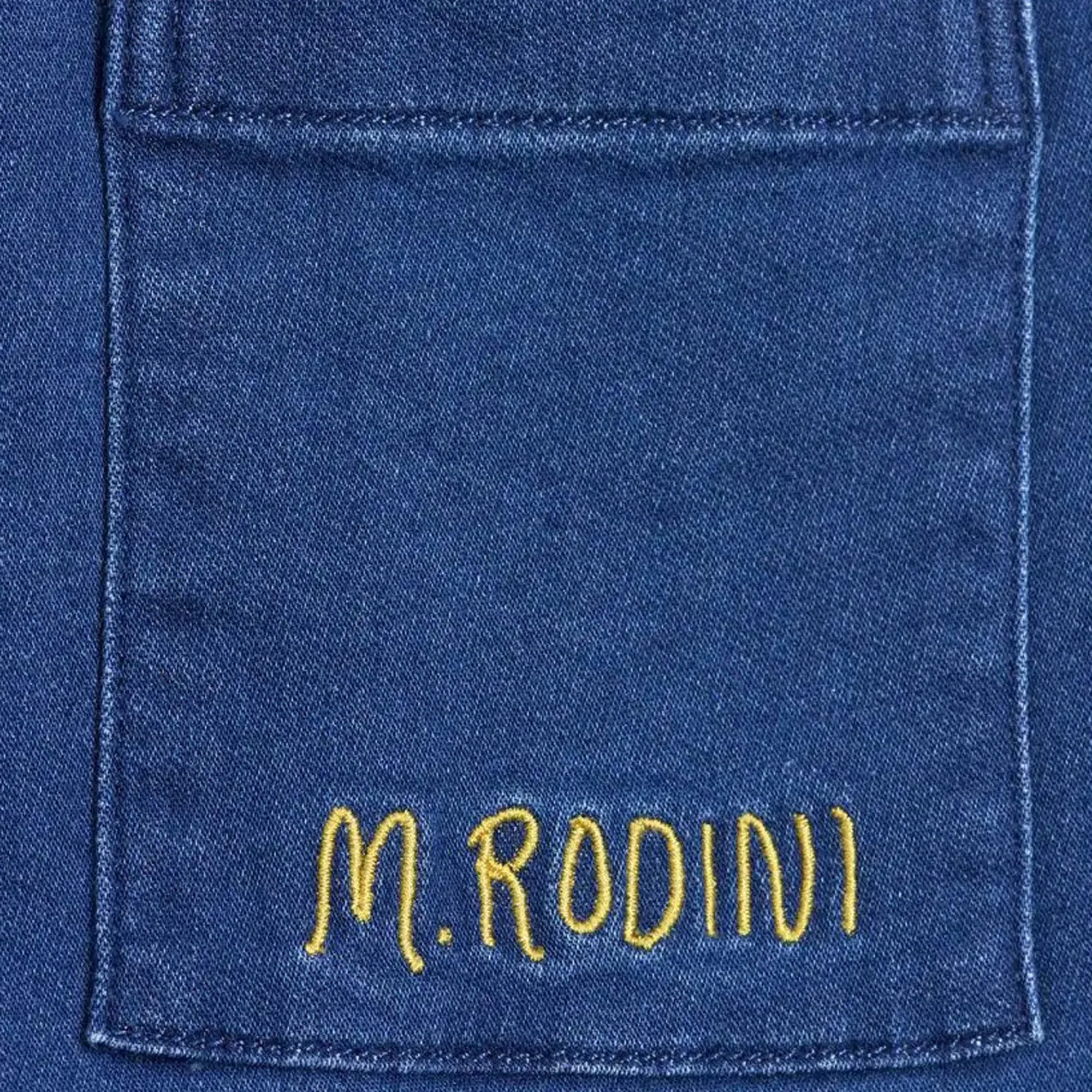 Mini Rodini tuta intera baby girl in denim di cotone organico