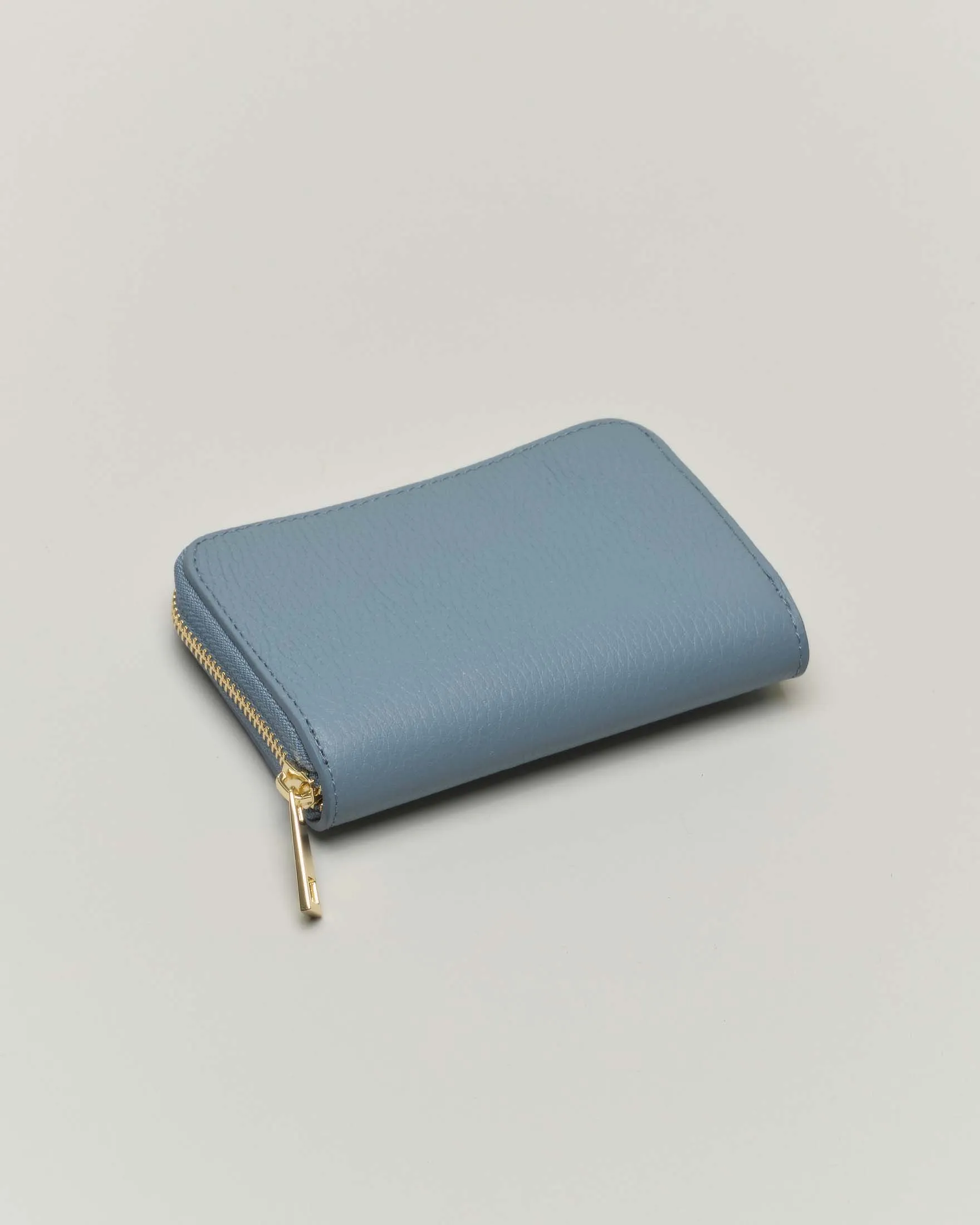 Portafoglio azzurro in pelle martellata con chiusura a cerniera